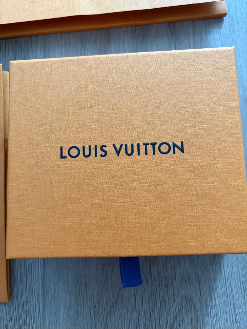 Louis Vuitton Orange Gift Set with Blue Ribbon Accents